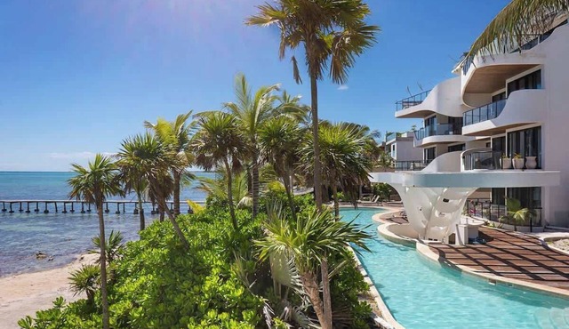 2BR Beachfront Apartment with Private Rooftop Pool