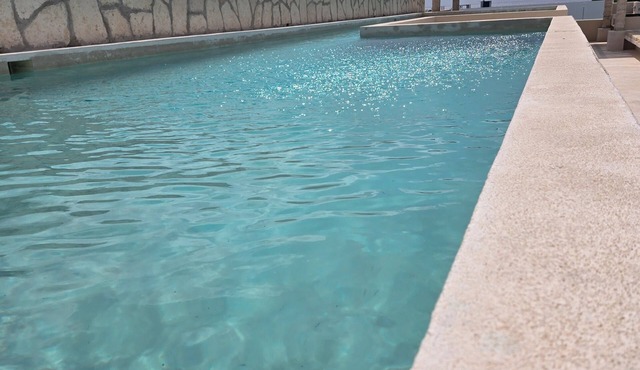 Brand New 2-bedroom 2-Bath. Rooftop Pool. 5 min walk to beach. Private parking.