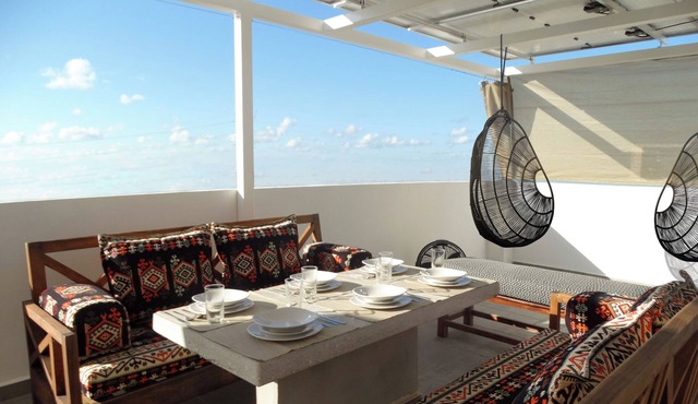 Green Living! Solar-Powered Rooftop Condo with Semi-Olympic Pool-Summer Discount
