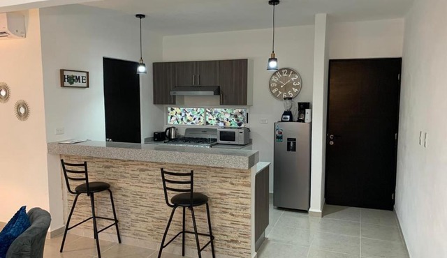 Hermoso apartamento piscina, céntrico, área libre.
