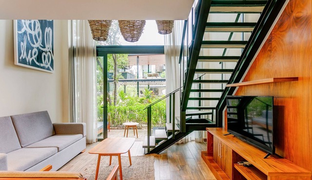 NEW Modern Bi-Level Condo Near Beach, Town, Ruins!