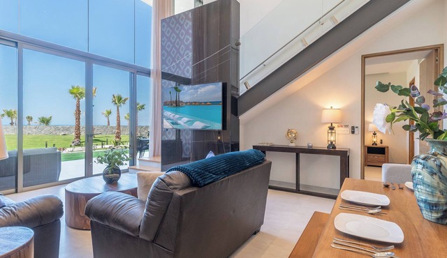 One 102: Elegant Beachfront Getaway with Unmatched Views