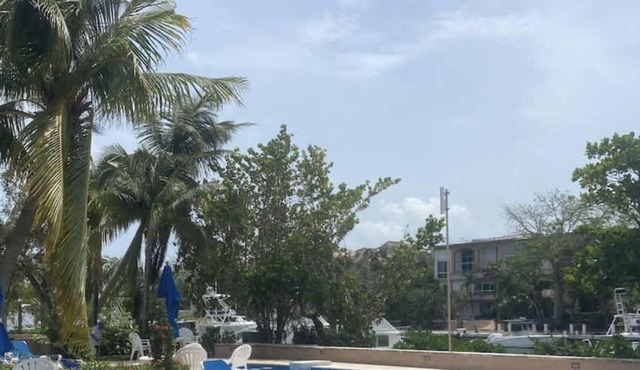 Puerto Aventuras: Condos frente al mar con piscina