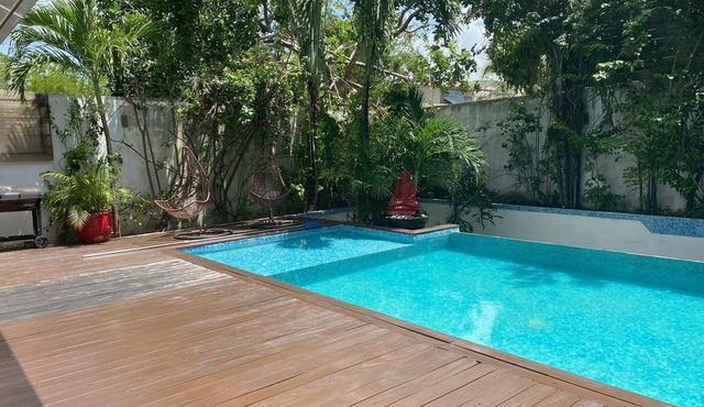 Spacious 7-bedroom villa in Playa del Carmen with private infinity pool.