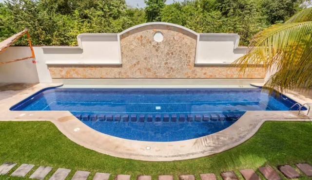 Spacious home in exclusive Playacar w/shared pool. Walk to beach and downtown!
