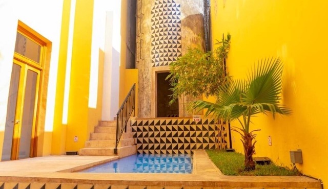 Sunny Retreat King Room with Pool, Steps from Museums, Markets & Local Flavors