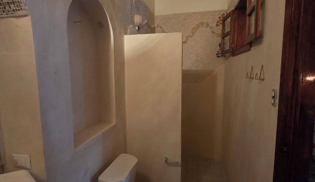 This poolside room features 2 queen beds, a large closet, and a private bathroom, in Centro