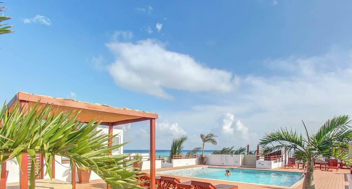 Zazil-ha Apartment | Casa del Mar - Rooftop Pool walk to Coco Beach