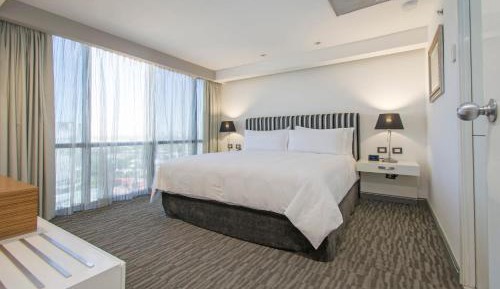 One-Bedroom King Suite with Balcony and City View