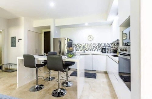 Villa Juarez Condo | NEW! Private Patio w/Lagoon View+Pools, Gym, Golf