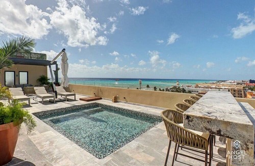 Downtown Condo | Rooftop Paradise with Pools Overlooking the Ocean