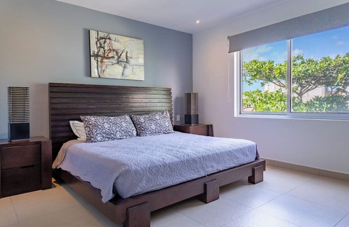 Playacar Fase II Condo | 4 Pools and Budget Penthouse in Vaiven. From BRIC Vacation Rentals