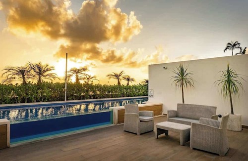 Gonzalo Guerrero Condo | Stylish Condo 1 Block to Beach & Rooftop Pool