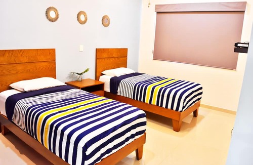 Zona Dorada Apartment | Ocean View, Steps from Beach. Brand New