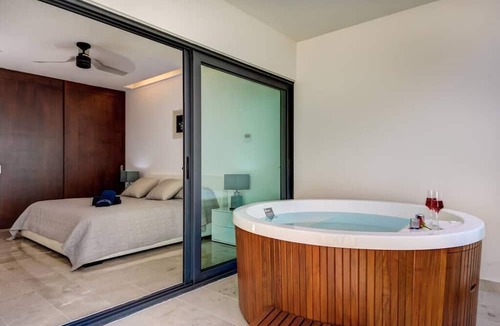 Gonzalo Guerrero Condo | *LUXURIOUS* One Bedroom Condo behind Mamitas Beach