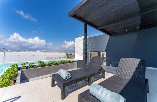 Gonzalo Guerrero Apartment | Brand new condo w/Pool Steps to Beach &5th