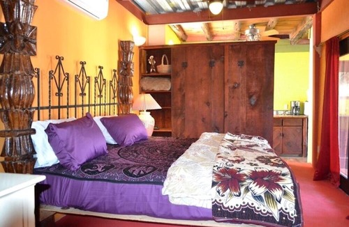 El Puerto Apartment | Eclectic rooms on the Malecon & Sea of Cortez. Furry friends welcome!
