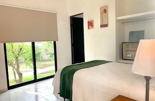 Homun Apartment | Cozy hotel suite in pleasant Homún with WiFi, AC