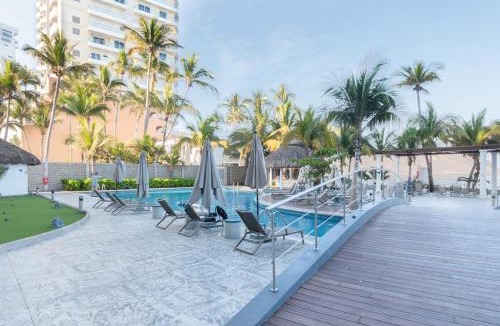 Zona Dorada Apartment | Camino al Mar Floor 24 King bed Beach Front