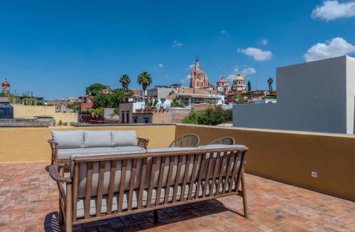 Zona Centro Villa | Casa La Purísima, Designer Retreat in Centro with Heated Pool & City Views