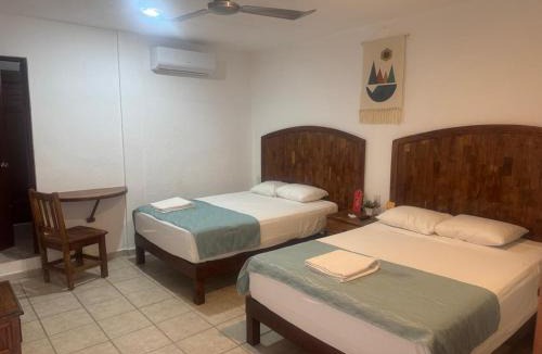 Downtown Hotel | Casa calendario azteca