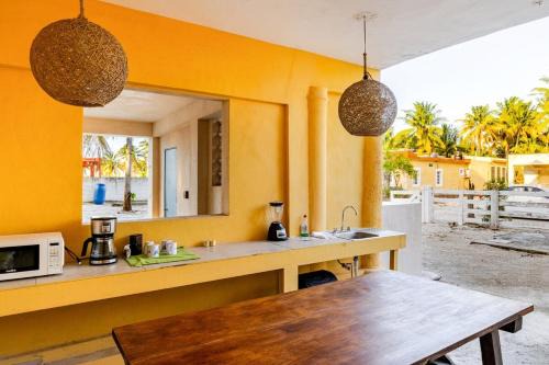 Room with art, pool, beach club